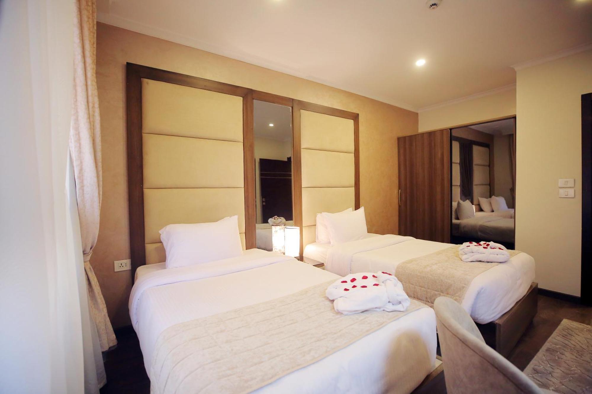 Taj & - Dokki Apartment